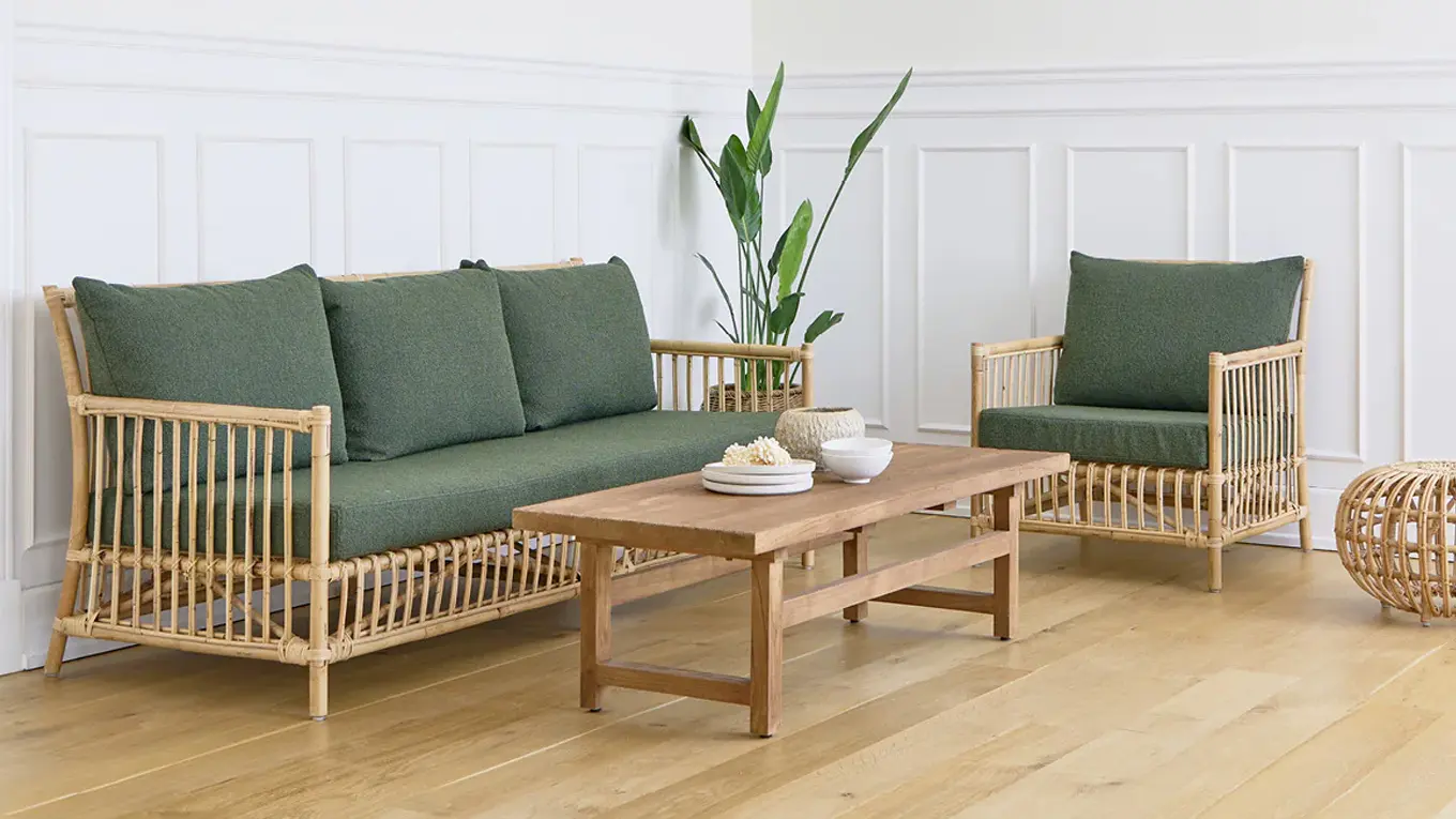 Sika Design Rattansofa und Sessel mit grünen polstern